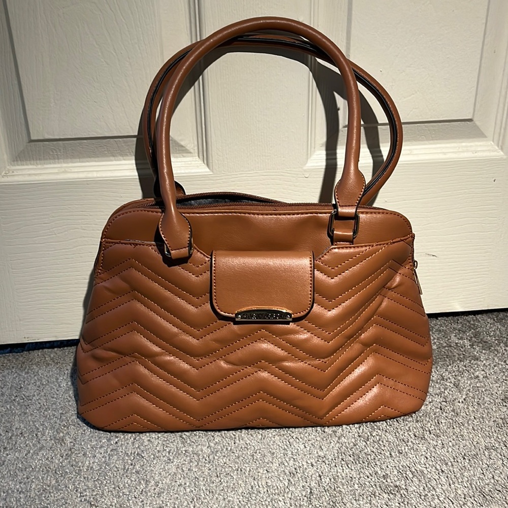 One tan Sag Harbor purse